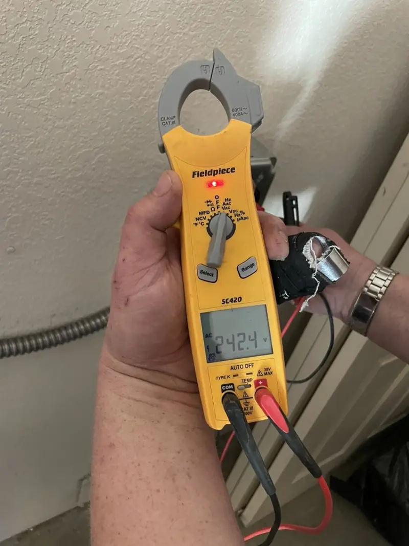 Voltage testing with clamp meter during Aluminum Wiring Replacement in Rincon Valley
